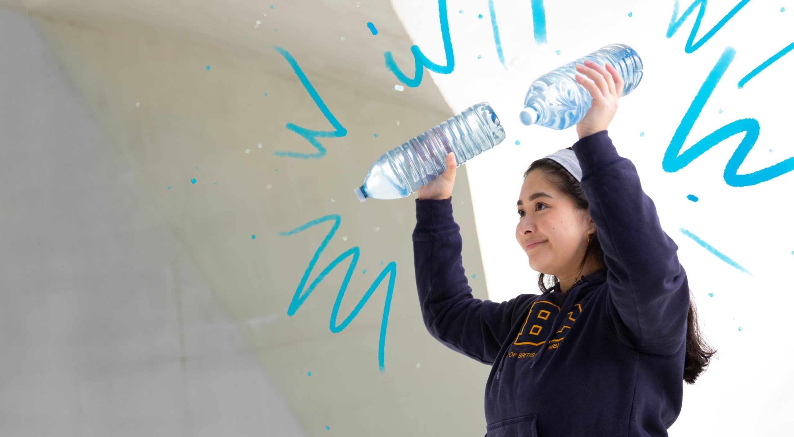 A person does an exercise workout by using water bottles as weights