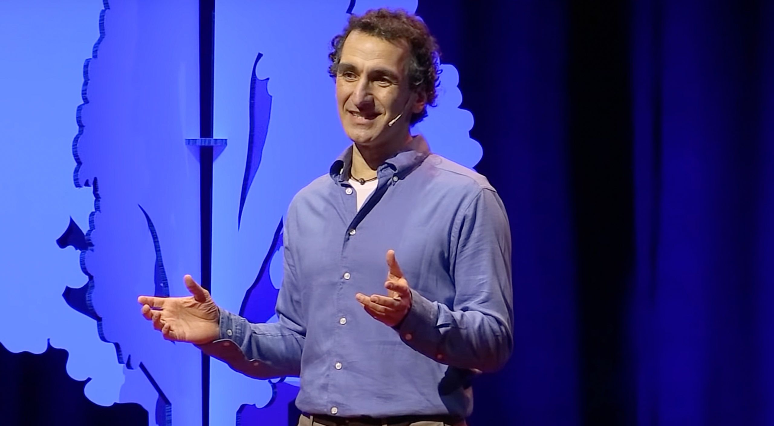 Photo of Dr. Simon Donner on stage at Tedx