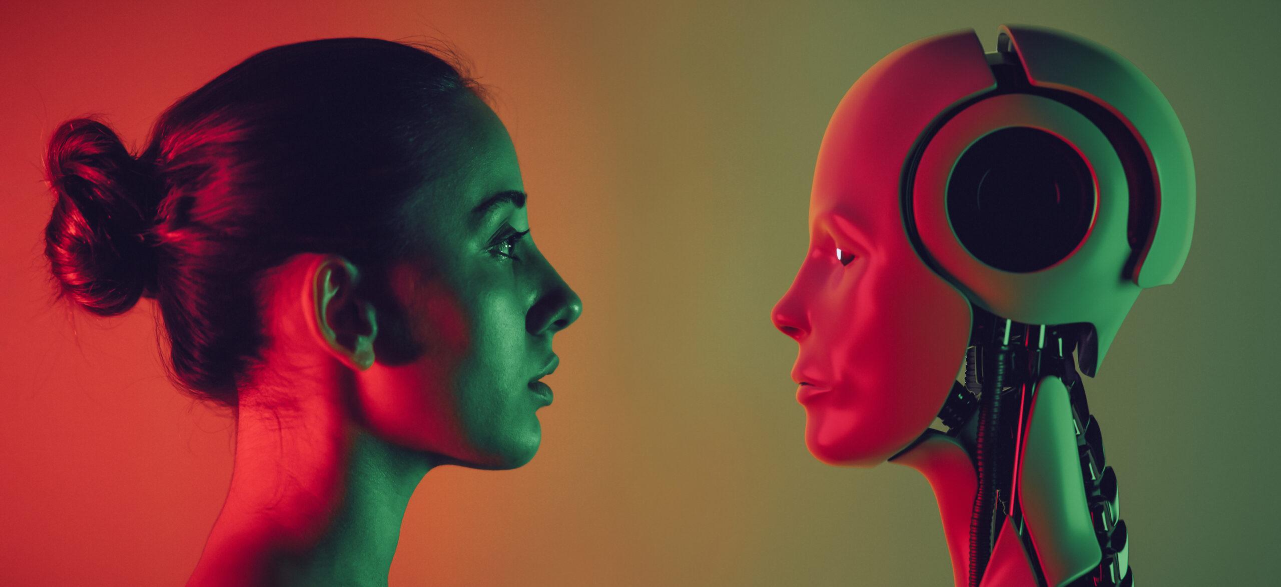 An image of a human with long hair in a bun and an AI robot facing off